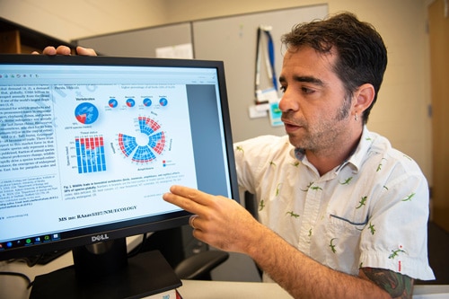 a man using a laptop computer