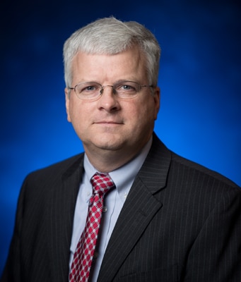 a man wearing a suit and tie