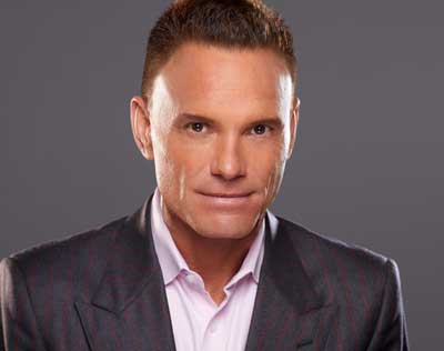 Kevin Harrington wearing a suit and tie