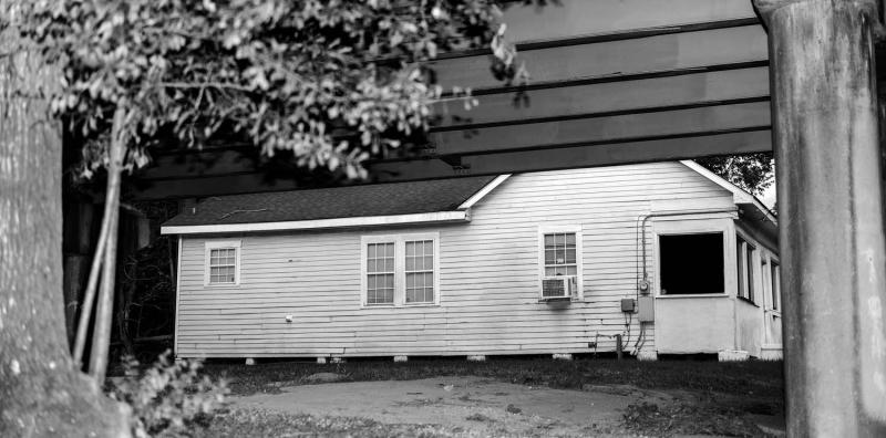 a bench in front of a house