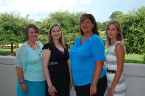 a group of people posing for a photo