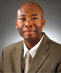 a man wearing a suit and tie a man wearing a suit and tie