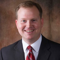 a man wearing a suit and tie