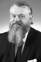 a man wearing a suit and tie a man wearing a suit and tie