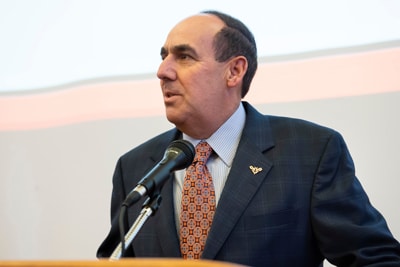 a man wearing a suit and tie a man wearing a suit and tie