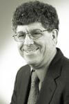 a man wearing a suit and tie a man wearing a suit and tie