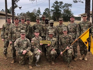 a group of people in uniform posing for a picture