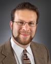 a man wearing a suit and tie a man wearing a suit and tie