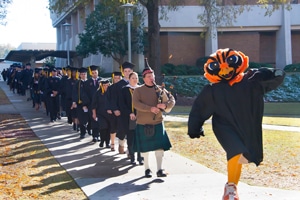 a group of people walking down a street