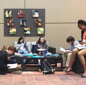 a group of people sitting in a room