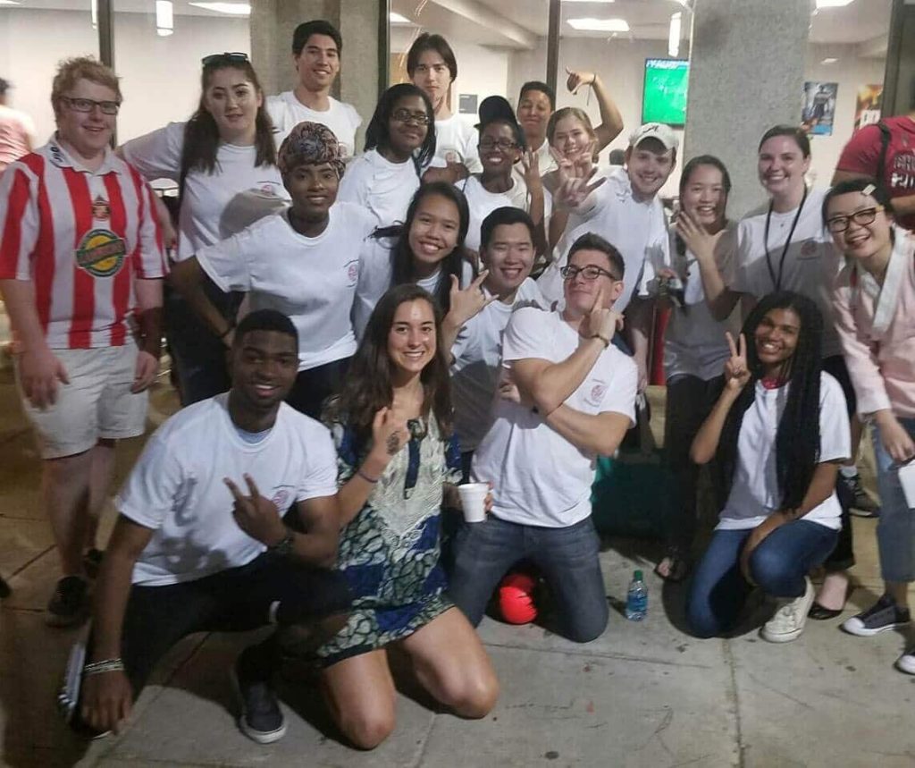 a group of people posing for a photo