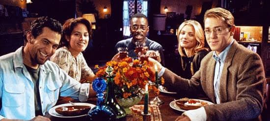 a group of people sitting at a table in a restaurant