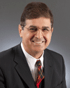 a man wearing a suit and tie a man wearing a suit and tie