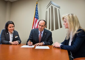 a group of people sitting at a table