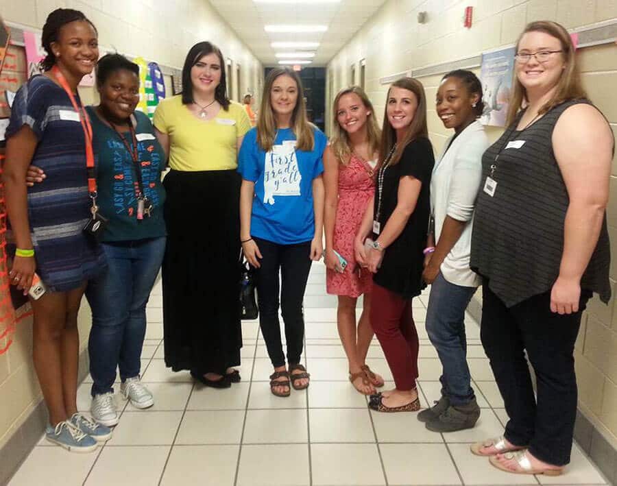 a group of people posing for a photo