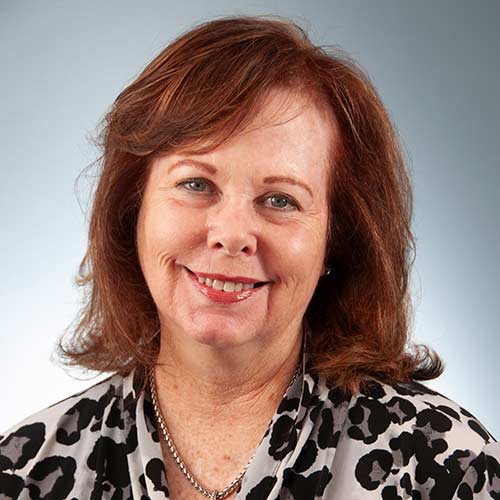 a woman smiling for the camera