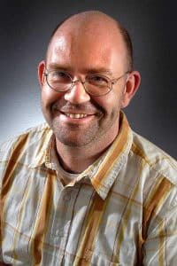a man wearing glasses a man wearing glasses