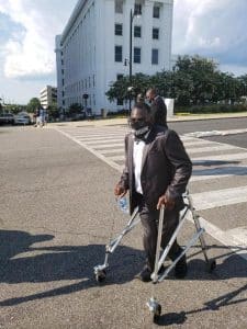 a man standing in a parking lot