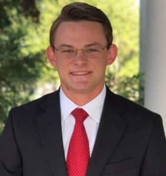 a man wearing a suit and tie