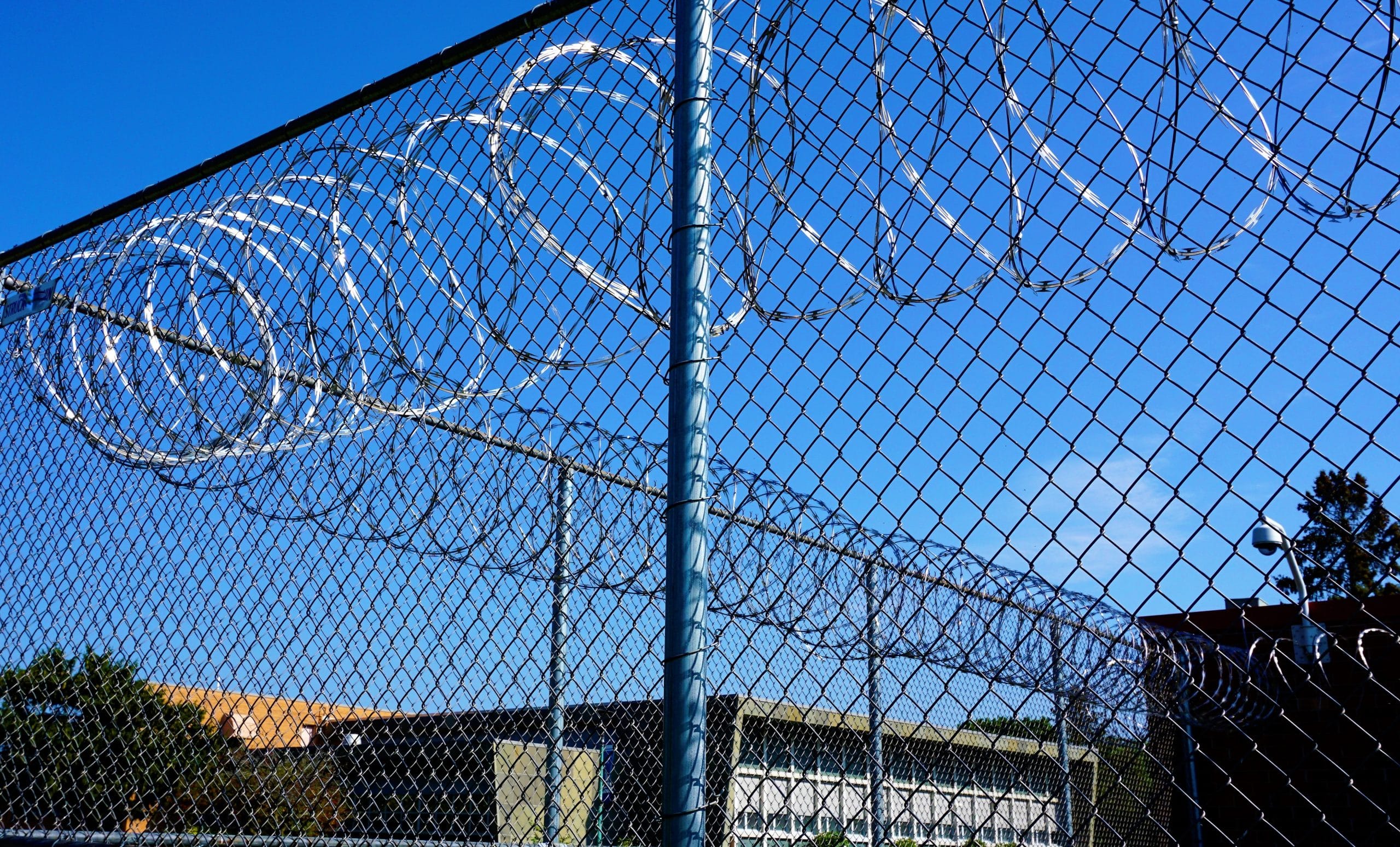 a close up of a wire fence