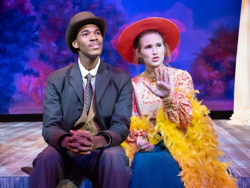 a man and a woman wearing a hat a man and a woman wearing a hat