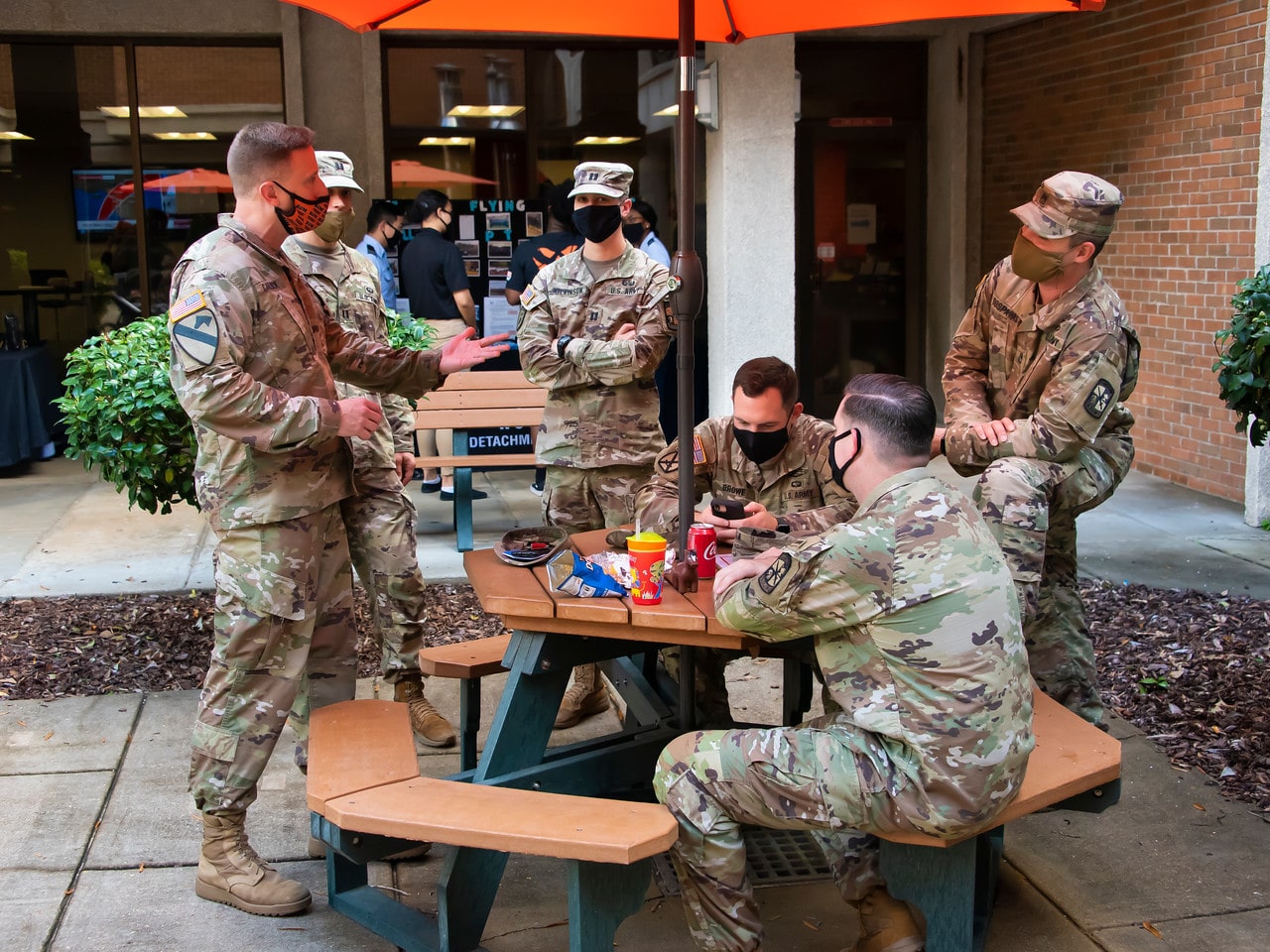 a group of people sitting on a bench