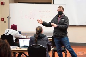 AUM faculty member Brett Davis teaches a recent class