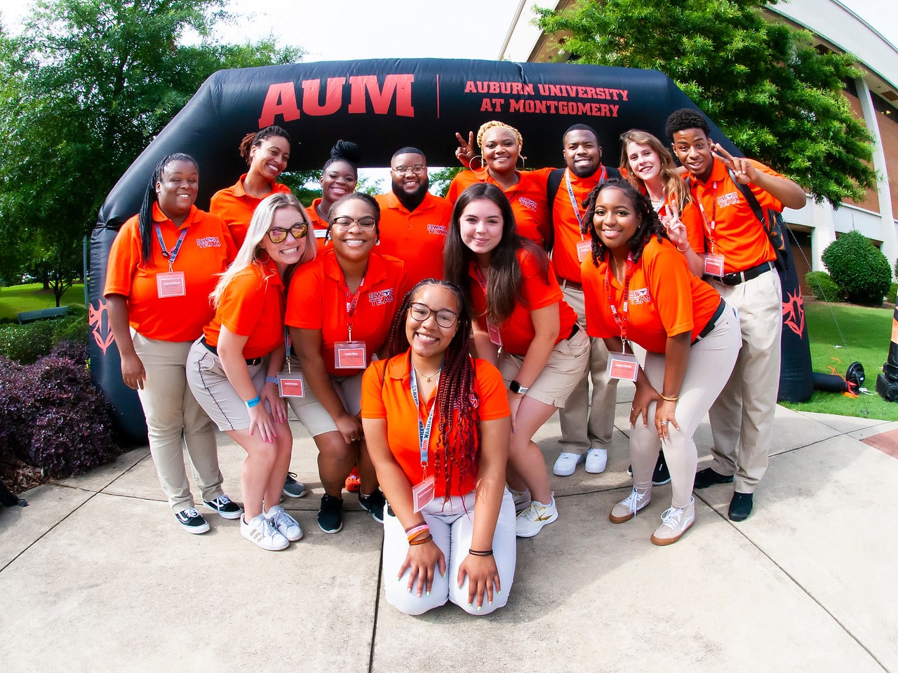 a group of people posing for the camera