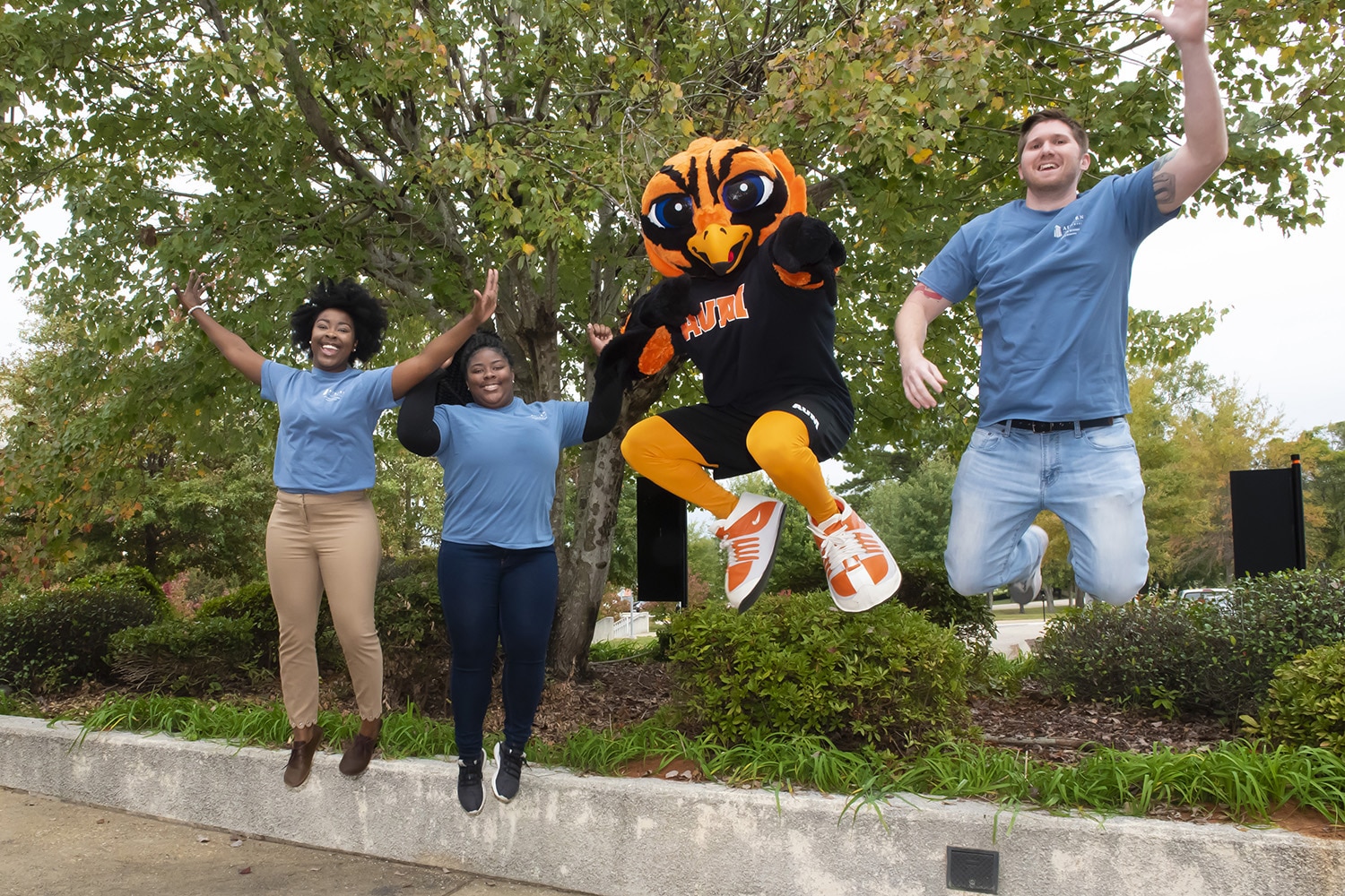 a group of people posing for the camera