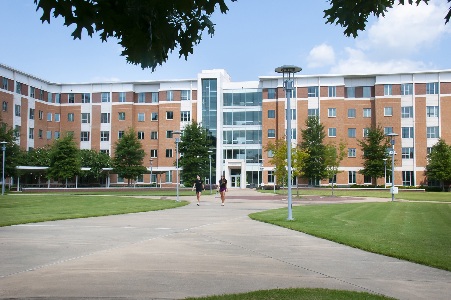 a large building in the middle of a park