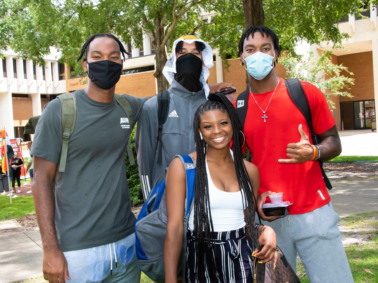 a group of people posing for the camera