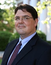 a man wearing a suit and tie