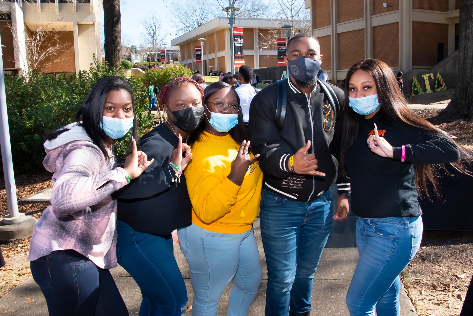 a group of people posing for the camera