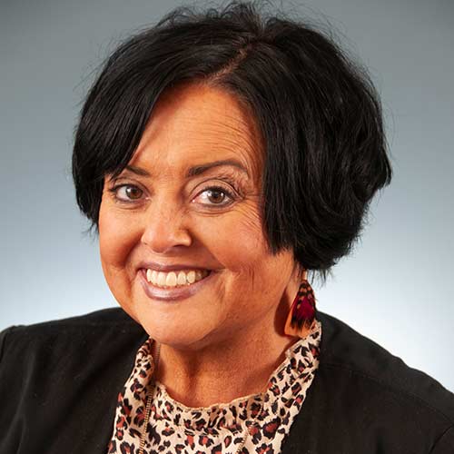 a woman smiling for the camera