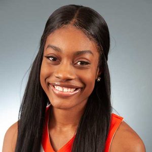 A Woman Smiling For The Camera