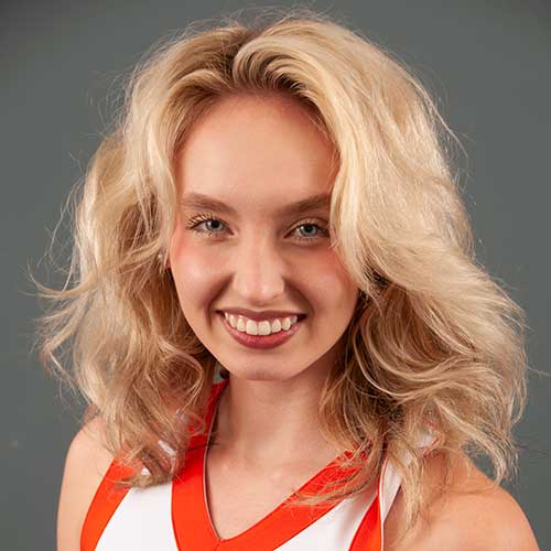 a woman smiling for the camera