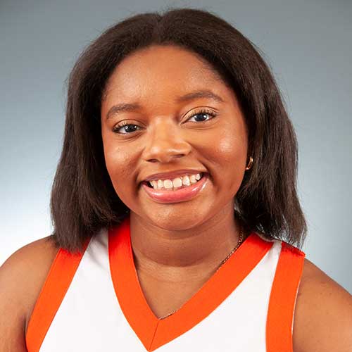 a woman smiling for the camera