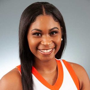 A Woman Smiling For The Camera