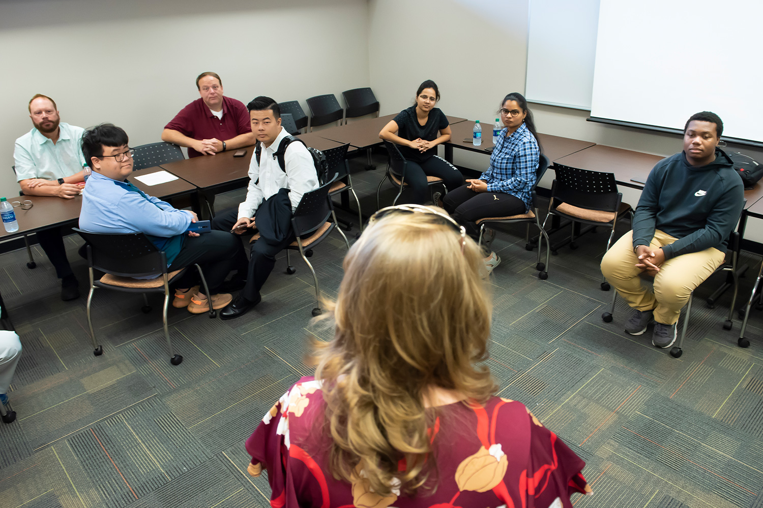 a group of people sitting in a room