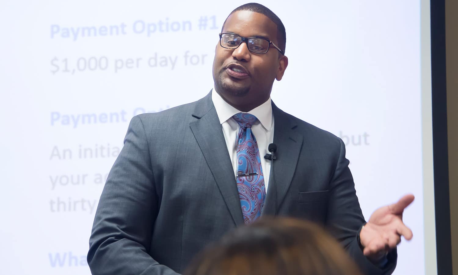 a man wearing a suit and tie