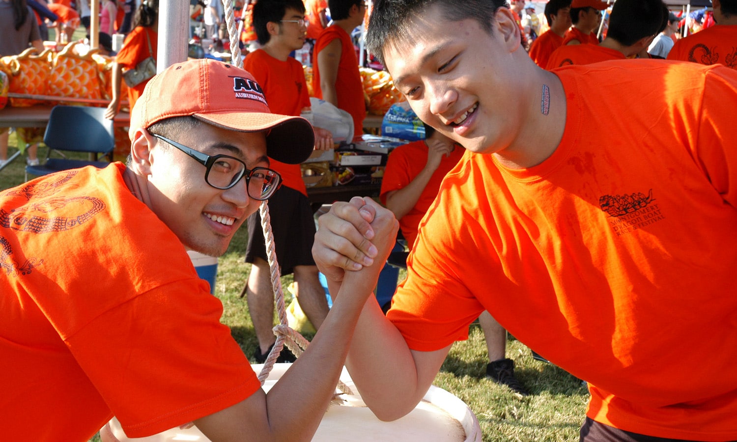 young men arm-wrestle