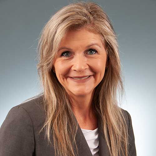 a woman smiling for the camera