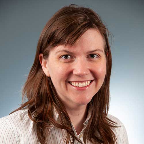 a woman smiling for the camera