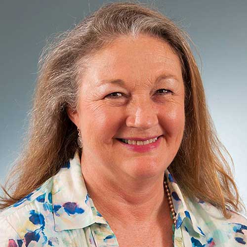 a woman smiling for the camera