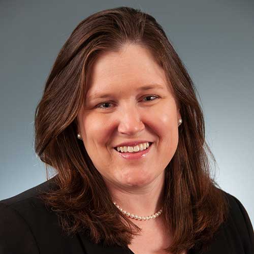a woman smiling for the camera