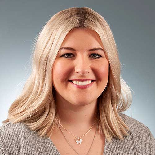 a woman smiling for the camera