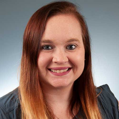 a woman smiling for the camera