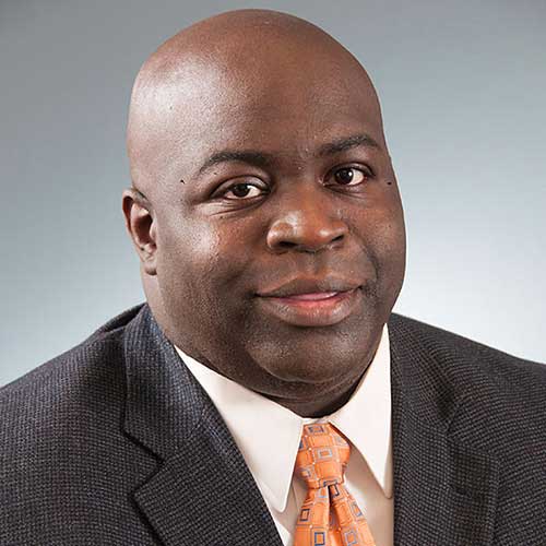 a man wearing a suit and tie