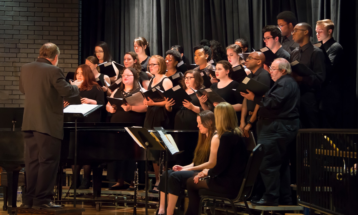 a group of people on a stage