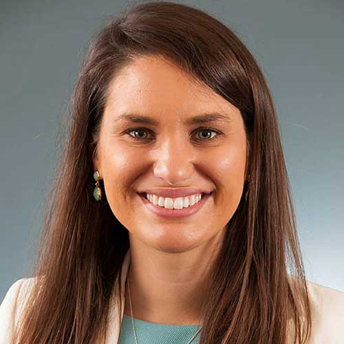 a woman smiling for the camera